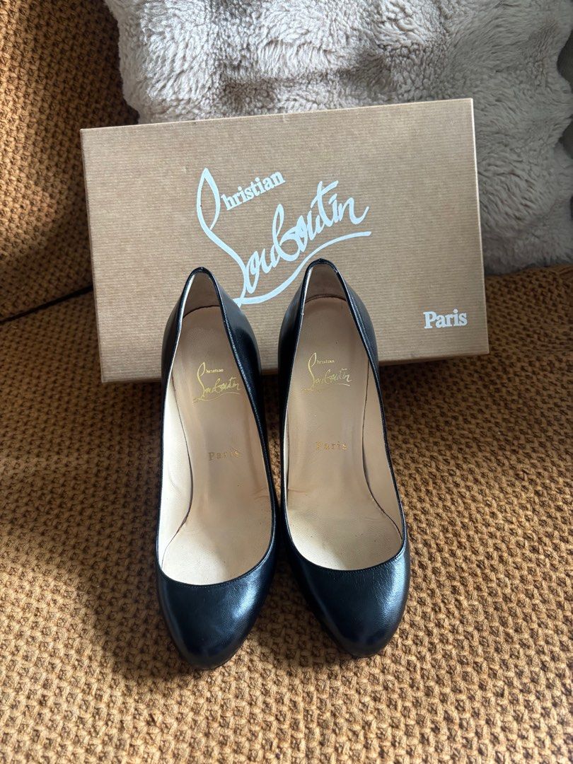 Christian Louboutin Black Heels (Category: Heels) located in Manila. Submitted by ivygen2708629 (Listing ID 1412293779, Image 1). Description: - Christian Louboutin black heels - Iconic red sole - Size: 37.5 - Pointed toe - Stiletto heel - Includes original box and dust bag - Made in Italy.