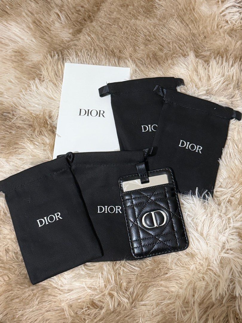 Dior Card Holder (Category: Luxury Bags & Wallets) located in Manila. Submitted by jafelizarte (Listing ID 1412152303, Image 2). Description: - Authentic Dior card holder - Black color - Quilted design - Features the iconic CD logo - Includes multiple Dior dust bags - Has a card slot and a strap at the top.