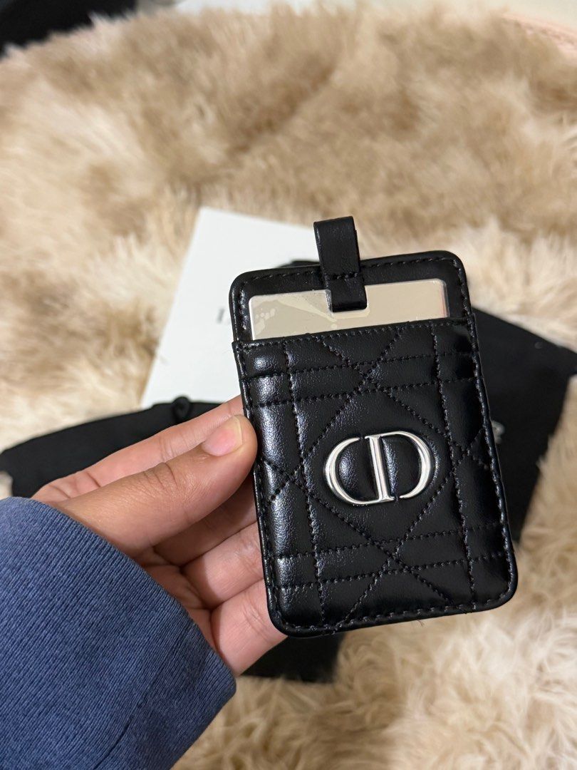 Dior Card Holder (Category: Luxury Bags & Wallets) located in Manila. Submitted by jafelizarte (Listing ID 1412152303, Image 1). Description: - Authentic Dior card holder - Black color - Quilted design - Features the iconic CD logo - Includes multiple Dior dust bags - Has a card slot and a strap at the top.