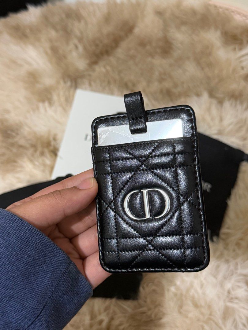 Dior Card Holder (Category: Luxury Bags & Wallets) located in Manila. Submitted by jafelizarte (Listing ID 1412152303, Image 3). Description: - Authentic Dior card holder - Black color - Quilted design - Features the iconic CD logo - Includes multiple Dior dust bags - Has a card slot and a strap at the top.
