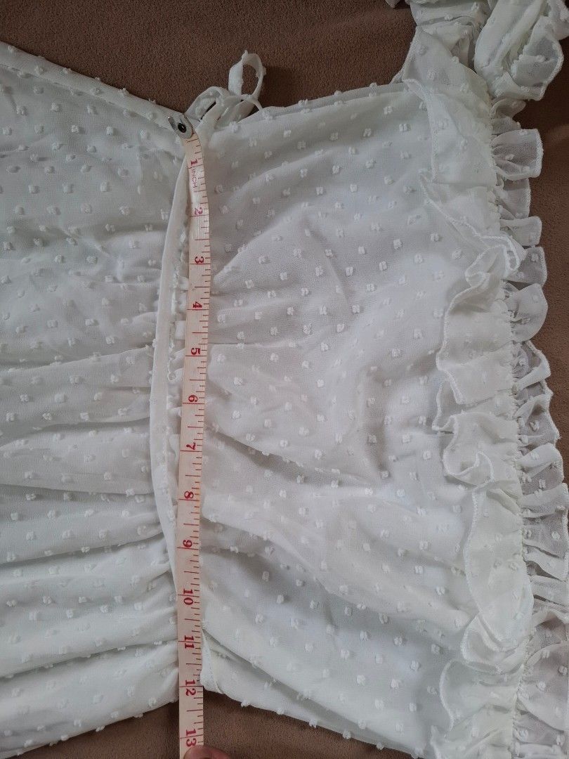 Double Crazy Off-Shoulder Dress - Size S (Category: Babies & Kids Fashion) located in Cavite. Submitted by l.m.m. (Listing ID 1412160502, Image 3). Description: - Double Crazy off-shoulder dress - Size: Small - Features: - Ruffled neckline - Ruffled hem - Waist tie - Subtle polka dot pattern - Waist measurement: Approximately 12 inches.