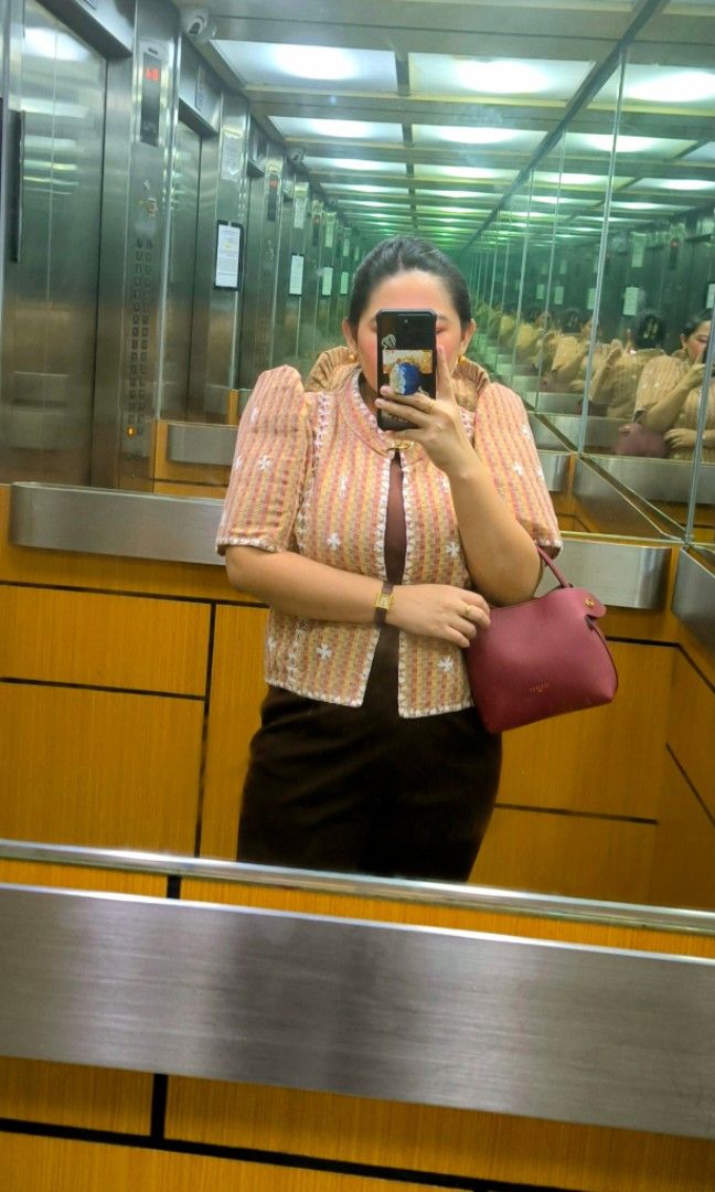 Embroidered Terno Sleeve Bolero (Category: Blouses) located in Makati City. Submitted by mampuan (Listing ID 1412027333, Image 2). Description: - Woven Filipiniana fabric with detailed white embroidery - Short puff sleeves - Mandarin collar - Button-down front - Color scheme: Yellow, red, and brown - White stitching on edges - Used several times, in good used condition.