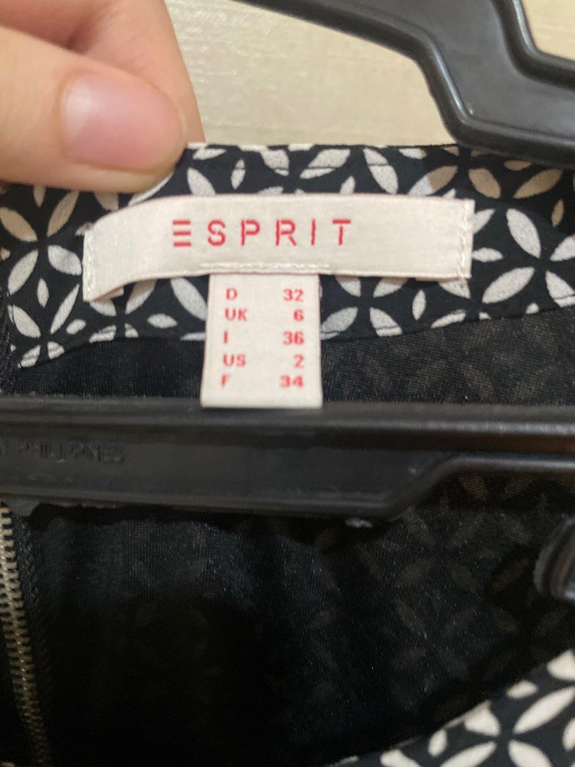Esprit Black and White Printed Dress (Category: Dresses) located in Mandaluyong City. Submitted by beautyfashdeclutter (Listing ID 1412216782, Image 2). Description: - Esprit dress in black and white - Features a unique geometric pattern on the top - Striking abstract design on the skirt - Sleeveless design - Knee-length style - Convenient zipper closure at the back - Suitable for various occasions.