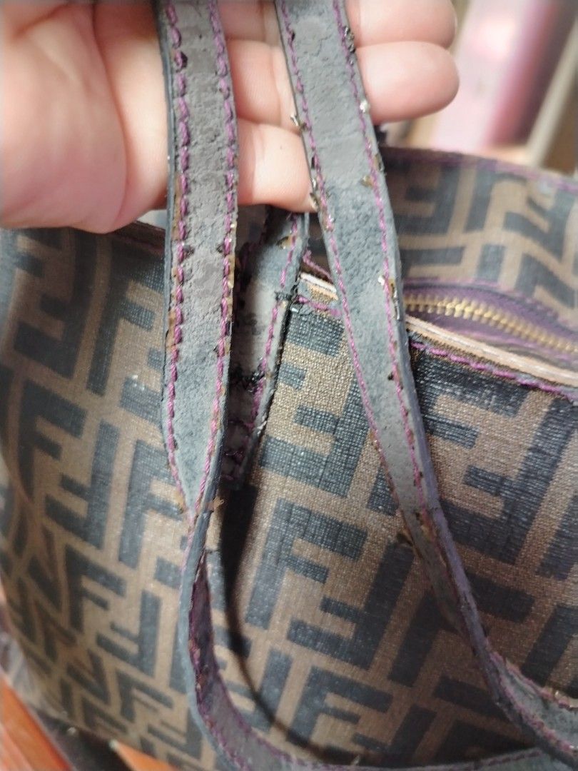 Fendi tote bag (Category: Luxury Bags & Wallets) located in Tagum. Submitted by mjprelovedbags2020 (Listing ID 1412160473, Image 3). Description: Bawal sa maarte. Need restoration handle rubs pde lagyan twilly sa mga madiskarte onLy. Coded and zipler closure.