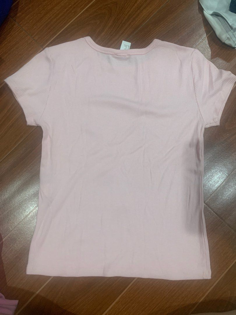 Forever 21 Ribbed T-shirt - Pink (Category: Shirts) located in Manila. Submitted by chuchay28 (Listing ID 1412265222, Image 3). Description: - Forever 21 pink ribbed t-shirt - Size: XL - Features: Round neckline, short sleeves - Condition: Good - Made in Vietnam.