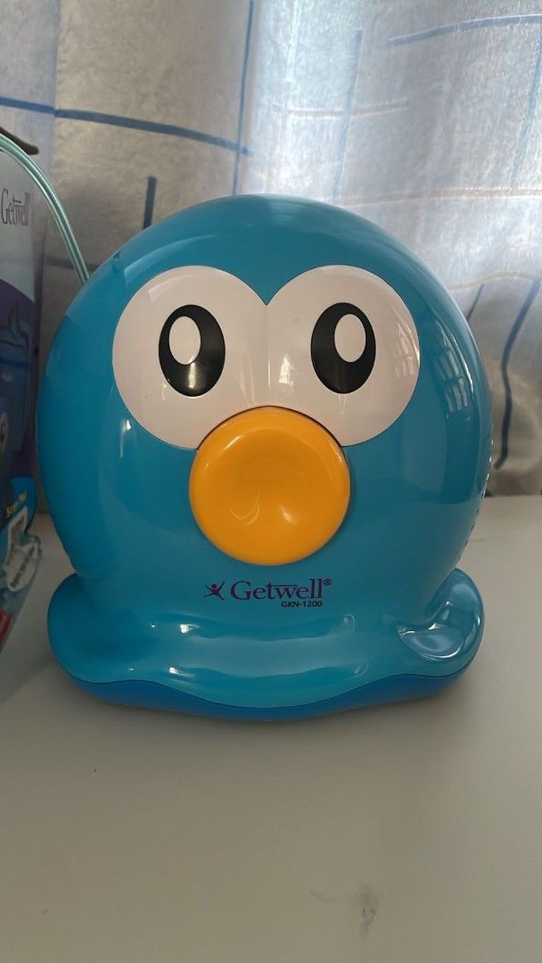 Getwell Jerry Fish Nebulizer GKN-1200 (Category: Medical Supplies & Tools) located in Valenzuela. Submitted by jannah528 (Listing ID 1412161209, Image 1). Description: Getwell Jerry Fish Nebulizer, ideal for homecare use. Features an oil-free design with a thermal protector. It delivers effective medication and has a high-quality motor. The nebulizer has a powerful, silent piston and is small and lightweight. Includes a built-in nebulizer holder.