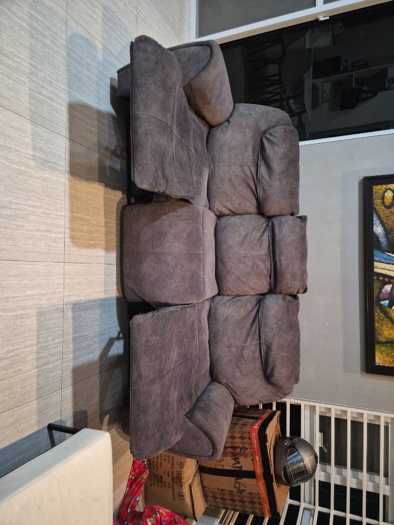Gray Reclining Sofa 3 seater (Category: Sofas) located in Manila. Submitted by abbyoo2025 (Listing ID 1412272206, Image 3). Description: - Gray 3-seater reclining sofa - Plush, cushioned design - Includes headrests - Reclining function for added comfort - Made of soft, textured fabric - Ideal for living room relaxation.