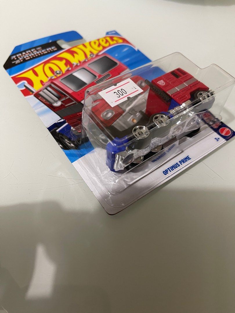 Hot Wheels Transformers Optimus Prime (Category: Vehicle & Diecast Models) located in Quezon City. Submitted by ccgem (Listing ID 1412145063, Image 1). Description: Selling one of my Optimus Primes! Got them from the diecast convention! Card intact and in pristine condition! Very rare in the malls. Shipping shouldered by the buyer!.