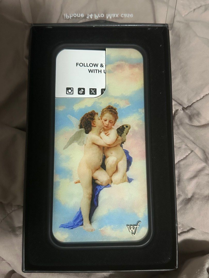 iPhone 14 Pro Max Angels Wildflower Case (Category: Cases & Sleeves) located in Manila. Submitted by mclovinnnn0 (Listing ID 1412237043, Image 2). Description: Original "Angels" iPhone 14 Pro Max case from Wildflower Cases. Proof of purchase provided on the third photo. FIXED PRICE. AUTOMATIC IGNORE SA LOWER THAN 1,400..