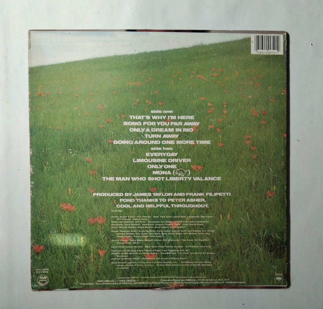 James Taylor - That's Why I'm Here Vinyl Record (Category: Vinyls) located in Makati City. Submitted by KAMUSIKATAYO (Listing ID 1412146785, Image 2). Description: James Taylor's "That's Why I'm Here" vinyl record. Features songs like "Everyday", "Song For You Far Away", and "Turn Away". The back cover lists the tracklist and production credits. Produced by James Taylor and Frank Filipetti. Includes songs like "Only One" and "Going Around One Mor
