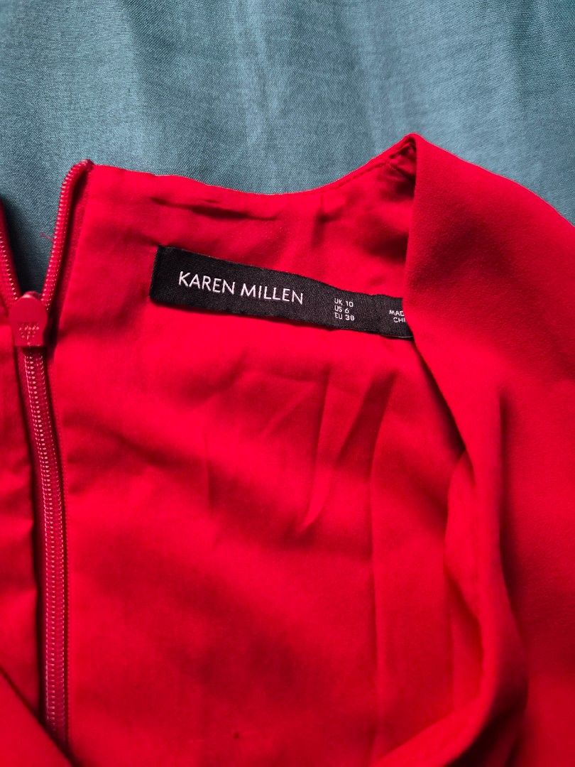 Karen Millen Red Dress (Category: Dresses) located in Carmen. Submitted by hayley39 (Listing ID 1412165952, Image 2). Description: - Karen Millen red dress - Long sleeves - Flattering silhouette - Back zipper closure - Smooth, flowing fabric - Vibrant red color - Ideal for special occasions and nights out.