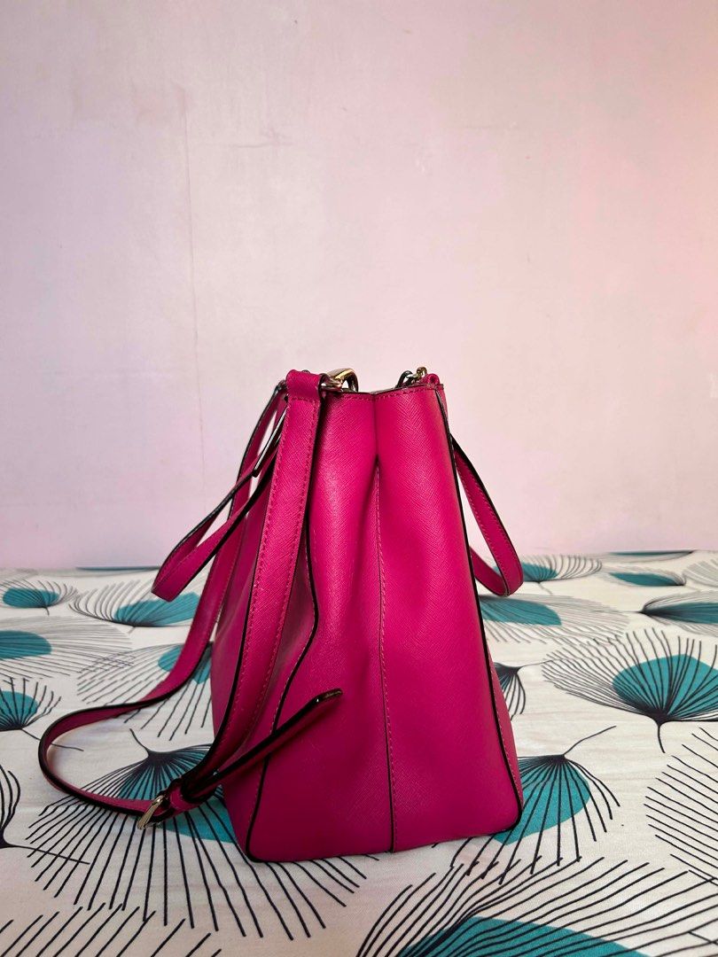 Kate Spade Pyper Two Way Work bag (Category: Luxury Bags & Wallets) located in San Fernando. Submitted by ilovemelochan (Listing ID 1412227960, Image 3). Description: Kate Spade Pyper Bag Guaranteed Authentic💯 Good as New ✨ Excellent Condition. No issue. •safiano leather • top handles and detachable long strap •Stunning pink color💗 • Includes Tag and care card •Spacious and organized interior •Great for work bag • fits 13 inches laptop .