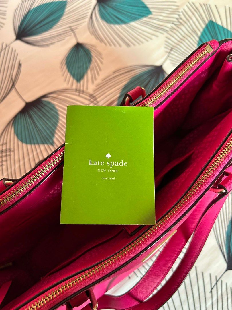 Kate Spade Pyper Two Way Work bag (Category: Luxury Bags & Wallets) located in San Fernando. Submitted by ilovemelochan (Listing ID 1412227960, Image 2). Description: Kate Spade Pyper Bag Guaranteed Authentic💯 Good as New ✨ Excellent Condition. No issue. •safiano leather • top handles and detachable long strap •Stunning pink color💗 • Includes Tag and care card •Spacious and organized interior •Great for work bag • fits 13 inches laptop .