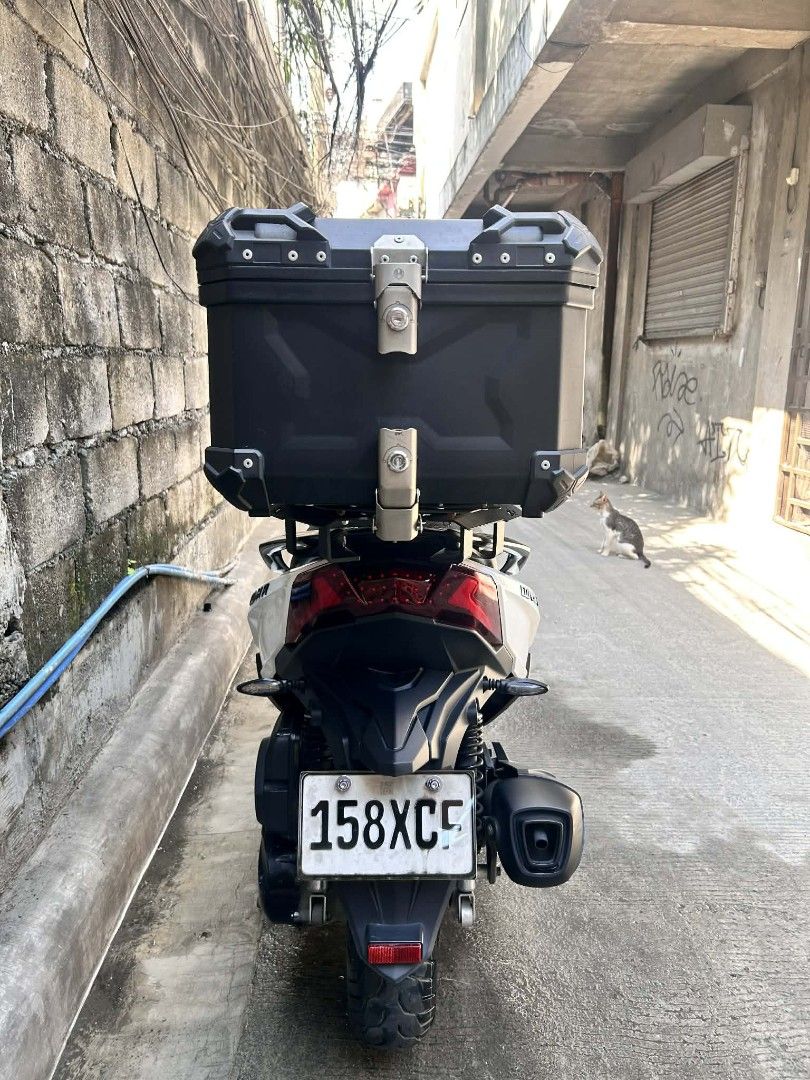 Kymco Dink R 150 Scooter (Category: Motorbikes for Sale) located in Manila. Submitted by mirandaaj491345 (Listing ID 1412174502, Image 3). Description: KYMCO DINK R 150 (Pearly White) 2024 model Registered until 2027 All stock (wala pang napalitang major parts) Alaga sa PMS Complete papers Orig OR/CR 11K+ odo 1st owner Upgrades: Ceramic coated worth 6K K3 rack bracket worth 2K HNJ Top box worth 2K New Fly ball Kaka change oil lang Location: Tagui