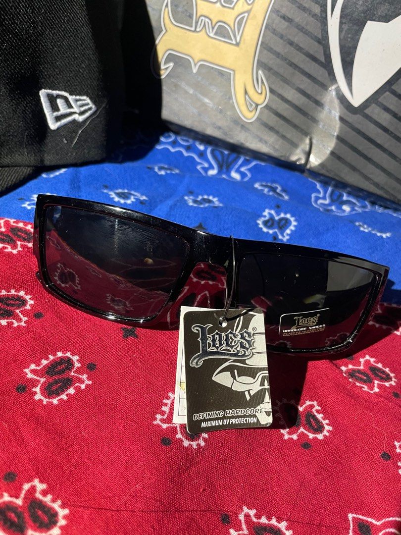 Locs Sunglasses (Category: Sunglasses & Eyewear) located in Paranaque City. Submitted by ClassPrettyApparel (Listing ID 1412256882, Image 1). Description: - Locs sunglasses - Sleek black frame - Rectangular design - Dark lenses - Lores logo on temples - Includes original tag - Perfect for a cool look ORIGINAL FROM CALIFORNIA SLIGHTLY NEGO.