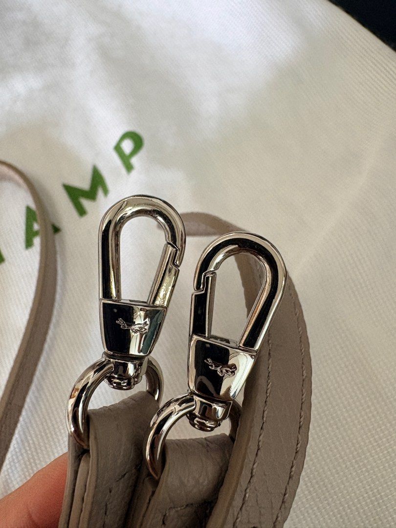 Longchamp Le Roseau Mini Top Handle Bag (Category: Luxury Bags & Wallets) located in Las Pinas. Submitted by joshdejos (Listing ID 1412191005, Image 2). Description: - Authentic Longchamp Le Roseau Mini Top Handle Bag (XS) - Clay colorway - Top handle and detachable shoulder strap - Includes original dust bag and card w/ original receipt from Longchamp Greenbelt branch - PHP 35,000 (Srp: 42,500). Slightly nego Condition: 10/10 Like new. Bag was b