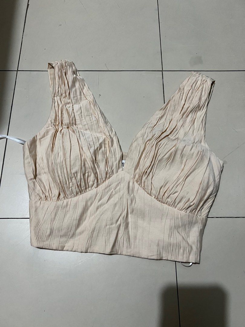 Love Bonito Cropped Top (Padded) (Category: Sleeveless) located in Manila. Submitted by justlooking4clothes (Listing ID 1412321662, Image 1). Description: RFS doesn’t fit. Washed never used. Peachy beige.