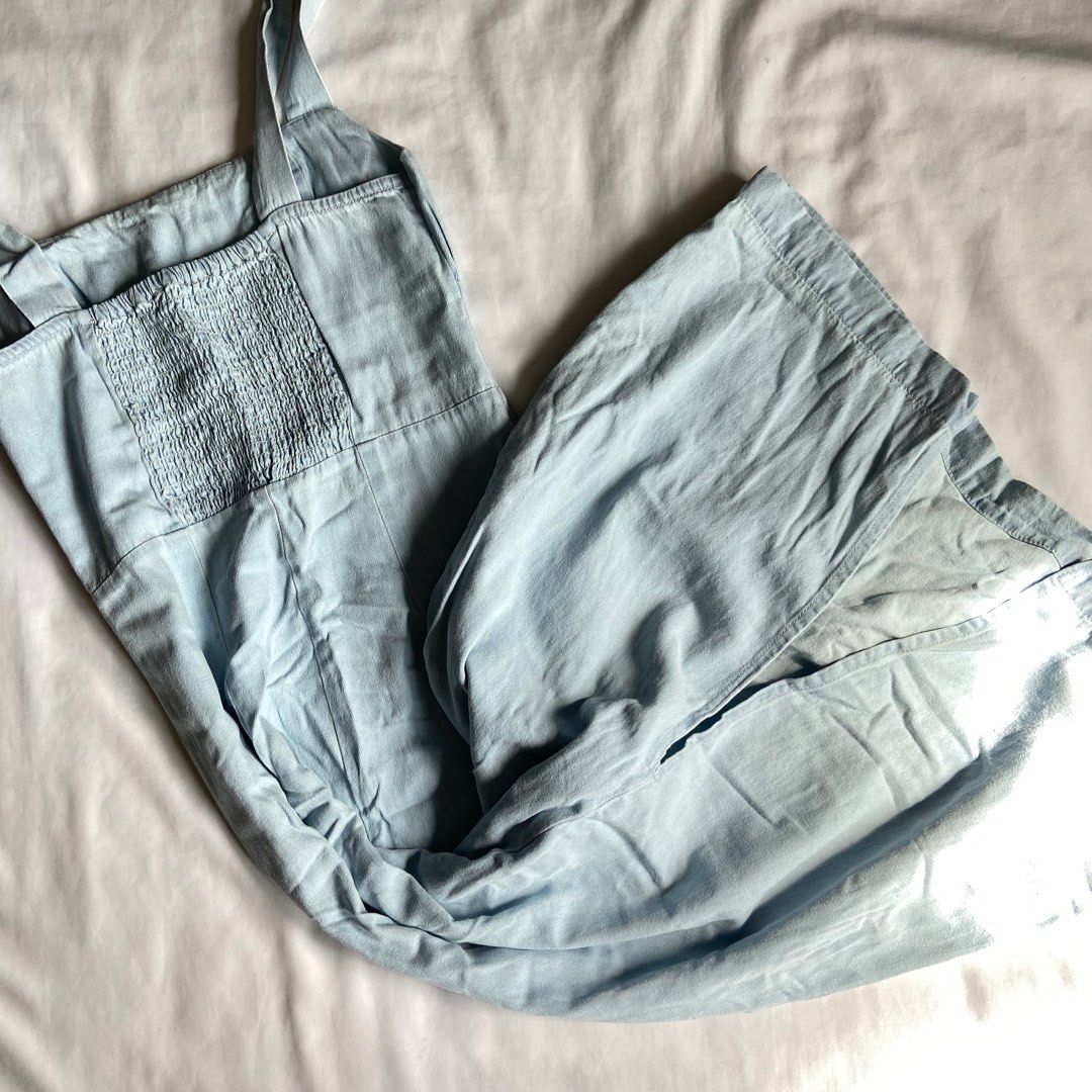 Mango Light Denim Smocked Midi Dress (Category: Dresses) located in Bulacan. Submitted by thriftbin (Listing ID 1412306532, Image 2). Description: AVAILABLE Size XS strechy fabric - smocked back bust 26" waist 25" length 39" (from underarm) No when worn pic ‼️Fixed price *ONLY OFFER IF SURE BUYER ship via J&T / sdd loc: bulacan.