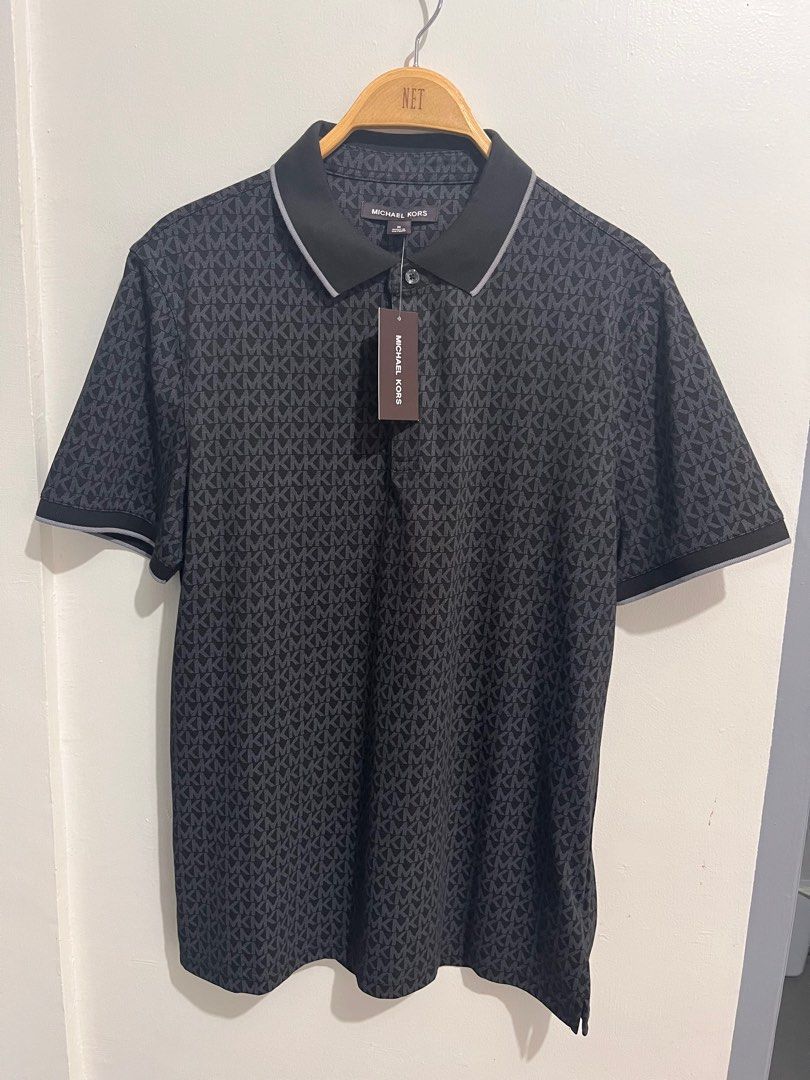 Michael Kors Black Polo Shirt Medium (Category: Tshirts & Polo Shirts ) located in Lipa City. Submitted by rcbuml (Listing ID 1412171240, Image 1). Description: Authentic Michael Kors Polo Shirt Brand New Black with all-over monogram Size Medium With Tag Bought in the US.
