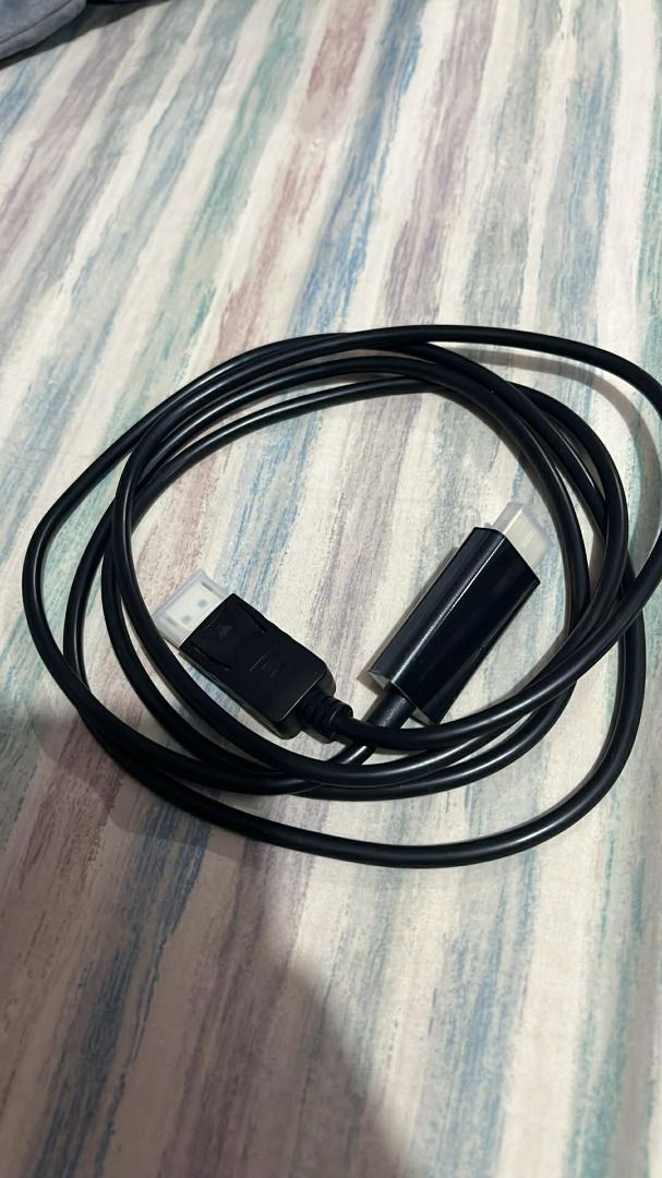 HDMI TO DISPLAY PORT (Category: Cables & Adaptors) located in Roxas City. Submitted by secondhand_splendor (Listing ID 1412258498, Image 1). Description: NEVER BEEN USED RFS:BOUGHT A WRONG ONE - Mini DisplayPort to DisplayPort adapter cable - Black color - Connects devices with Mini DisplayPort to displays with DisplayPort - Supports video and audio transmission.