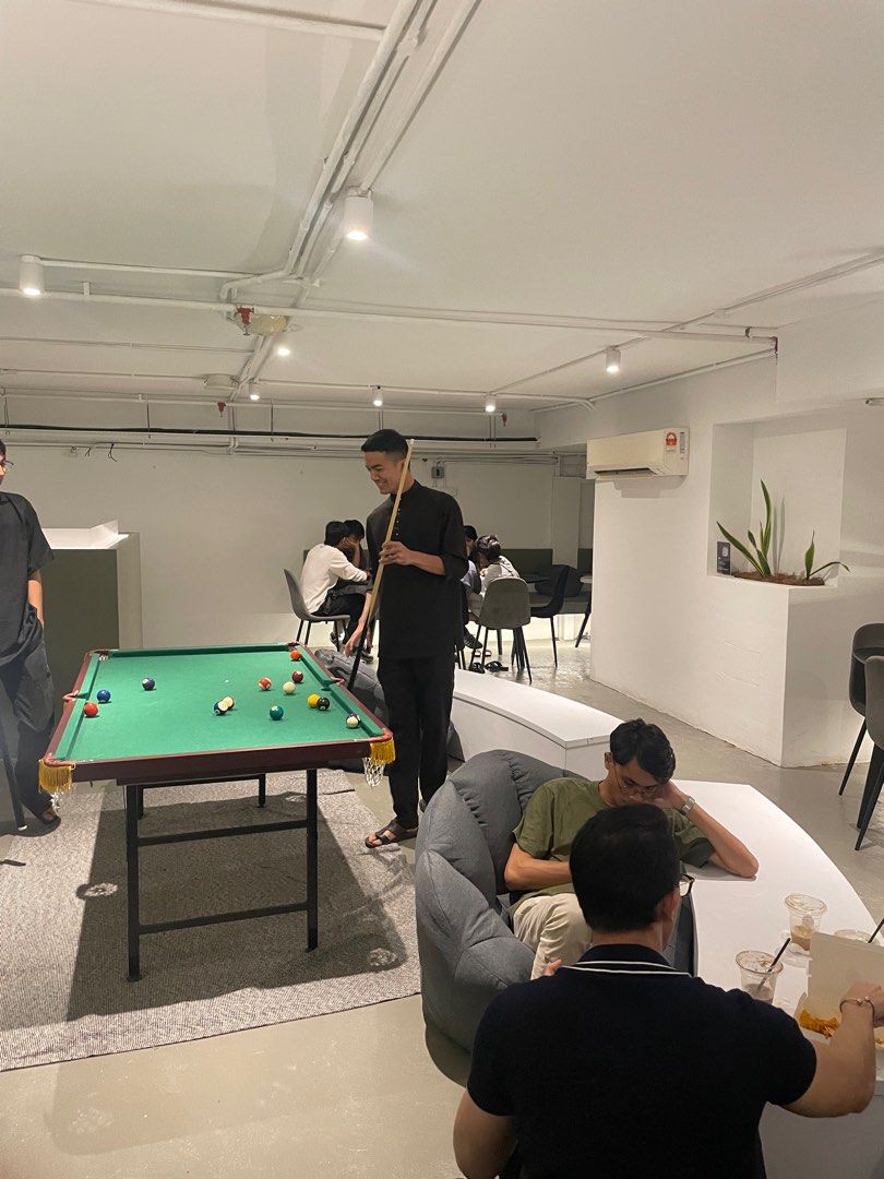 Mini Pool Table (Category: Billiards & Bowling) located in Kuala Lumpur. Submitted by shnoz_9058 (Listing ID 1412228470, Image 2). Description: - Compact pool table - Green felt surface with Wooden frame - Includes pool balls and cues - Foldable and Suitable for smaller spaces - Got few defects but can still be in use..