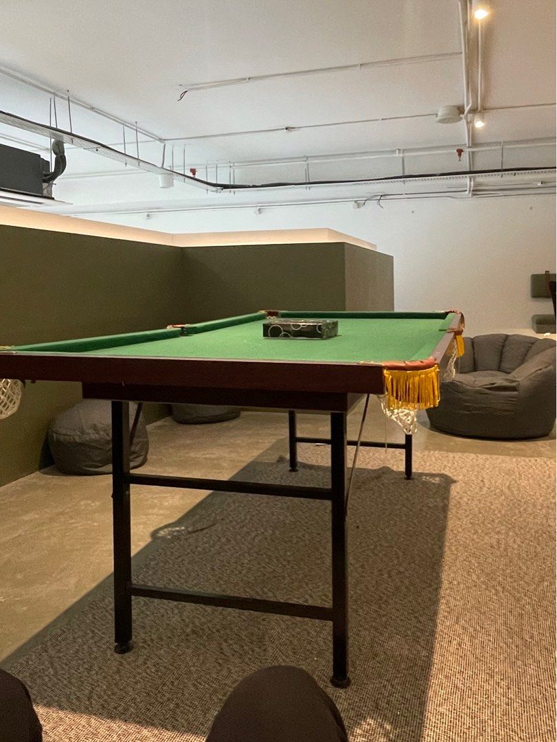 Mini Pool Table (Category: Billiards & Bowling) located in Kuala Lumpur. Submitted by shnoz_9058 (Listing ID 1412228470, Image 3). Description: - Compact pool table - Green felt surface with Wooden frame - Includes pool balls and cues - Foldable and Suitable for smaller spaces - Got few defects but can still be in use..
