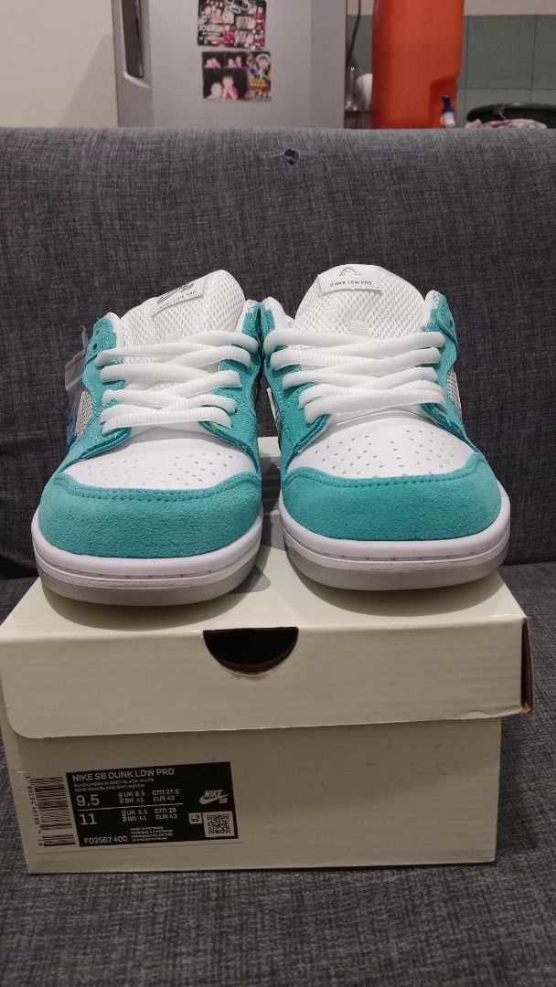 Nike SB Dunk Low Pro April Skateboards (Category: Sneakers) located in Valenzuela. Submitted by jannah528 (Listing ID 1412326486, Image 3). Description: - Nike SB Dunk Low Pro April Skateboards - Size: US 9.5 / EUR 43 / CM 27.5 - Colorway: White and Teal - Features a silver swoosh - Includes original box - Comes with an extra pair of blue laces - "April" branding on the heel.