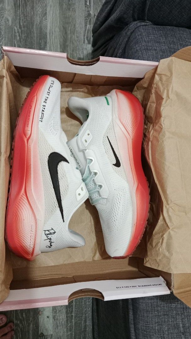 Nike Zoom Fly 5 Running Shoes (Category: Sneakers) located in Valenzuela. Submitted by jannah528 (Listing ID 1412326675, Image 2). Description: - Nike Zoom Fly 5 - Color: White and red - Features a black Nike swoosh - Mint green laces - Size: US 8, UK 5.5, EUR 39, CM 25 - Unique design with text details - Red sole with white details.