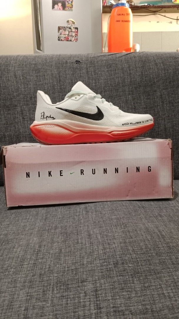 Nike Zoom Fly 5 Running Shoes (Category: Sneakers) located in Valenzuela. Submitted by jannah528 (Listing ID 1412326675, Image 3). Description: - Nike Zoom Fly 5 - Color: White and red - Features a black Nike swoosh - Mint green laces - Size: US 8, UK 5.5, EUR 39, CM 25 - Unique design with text details - Red sole with white details.