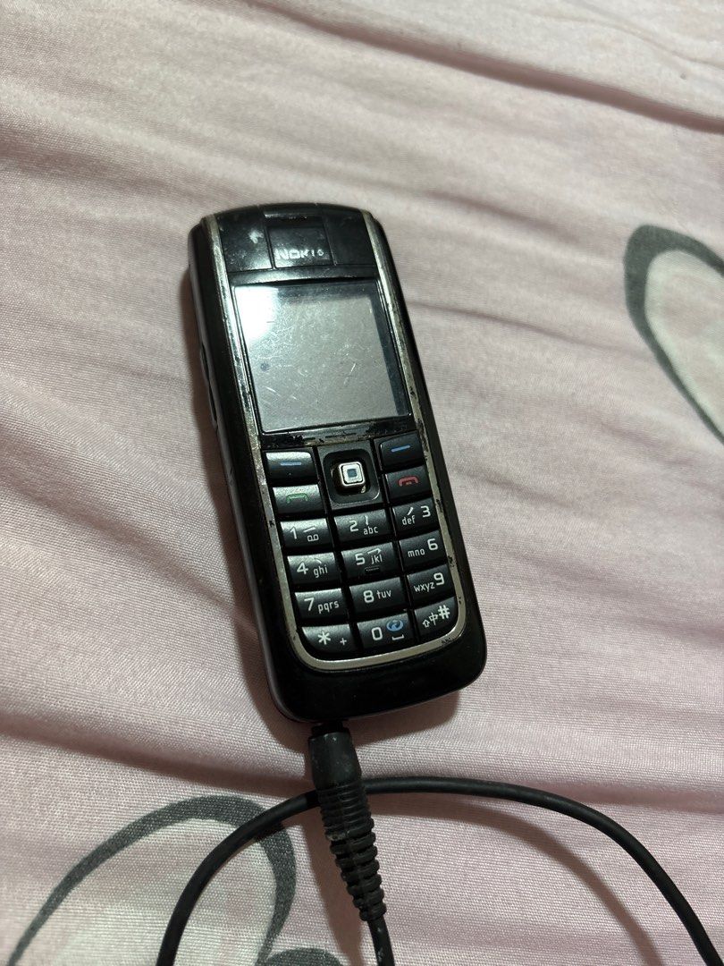 Nokia Basic Phone (Category: Early Generation Mobile Phones) located in Singapore. Submitted by jcfollower4 (Listing ID 1412198863, Image 1). Description: - Classic Nokia phone - Black color - Fully functional - Includes charging cable - Perfect for calls and texts or as a spare phone.