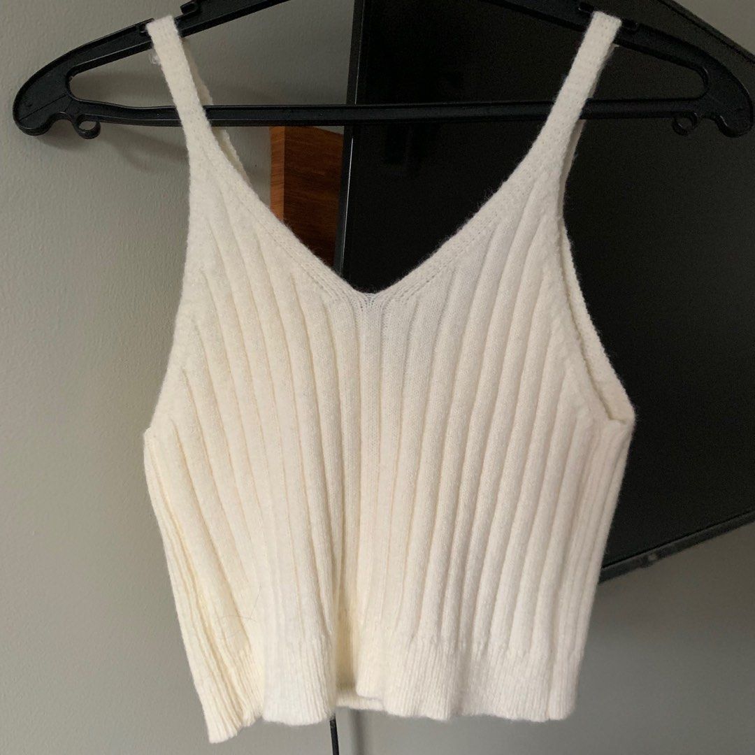 Off White / Cream Knitted Sleeveless Top (Category: Blouses) located in Manila. Submitted by farfromregularco (Listing ID 1412307390, Image 3). Description: Off White / Cream Knitted Sleeveless Top Never worn, only washed RFS: doesn't suit me Size: Fits S - M Delivery Details: 📍MOA Pasay, Manila Payment: BPI / Gcash / COD Message me for meetups Shipping: Grab / Lalamove / MrSpeedy Message me for meetups. (LRT, MRT, Major Landmarks) Shipping must