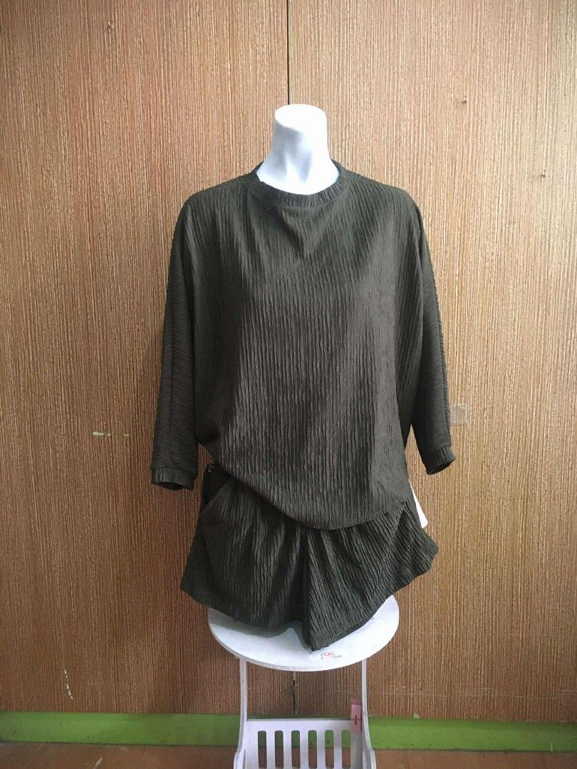 Olive Green Textured Top and Shorts Set (Category: Sets or Coordinates) located in Caloocan City. Submitted by _misskaye (Listing ID 1412272745, Image 1). Description: - Olive green top and shorts set - Top: Round neckline, three-quarter sleeves - Shorts: Ruffled hem - Fabric: Vertical ribbed texture - Color: Muted olive green ⚜️ Location: Brgy. 167, Caloocan City ⚜️ MOD: J&T or LALAMOVE ⚜️ no cancellation/exchange/refund ⚜️ MOP: GCASH or MAYA ⚜️