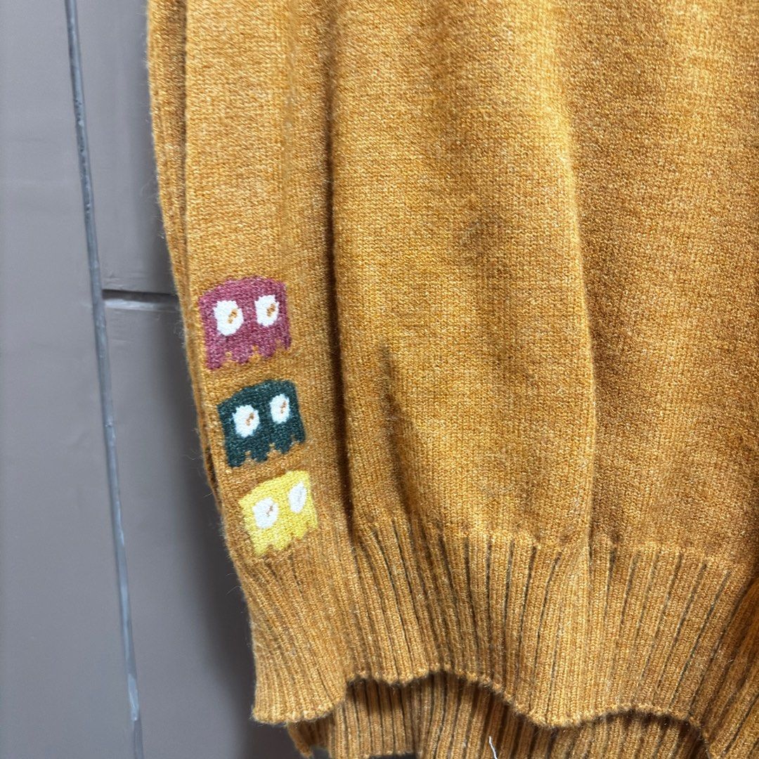 Pacman Embroidered Vest (Category: Blouses) located in Balanga. Submitted by heyyletsdeclutter (Listing ID 1412203348, Image 3). Description: - Mustard yellow vest - Pacman ghost embroidery - Ribbed neckline and hem - Sleeveless - Side slit - Pacman ghost design on front and sleeve - Plain mustard yellow back.