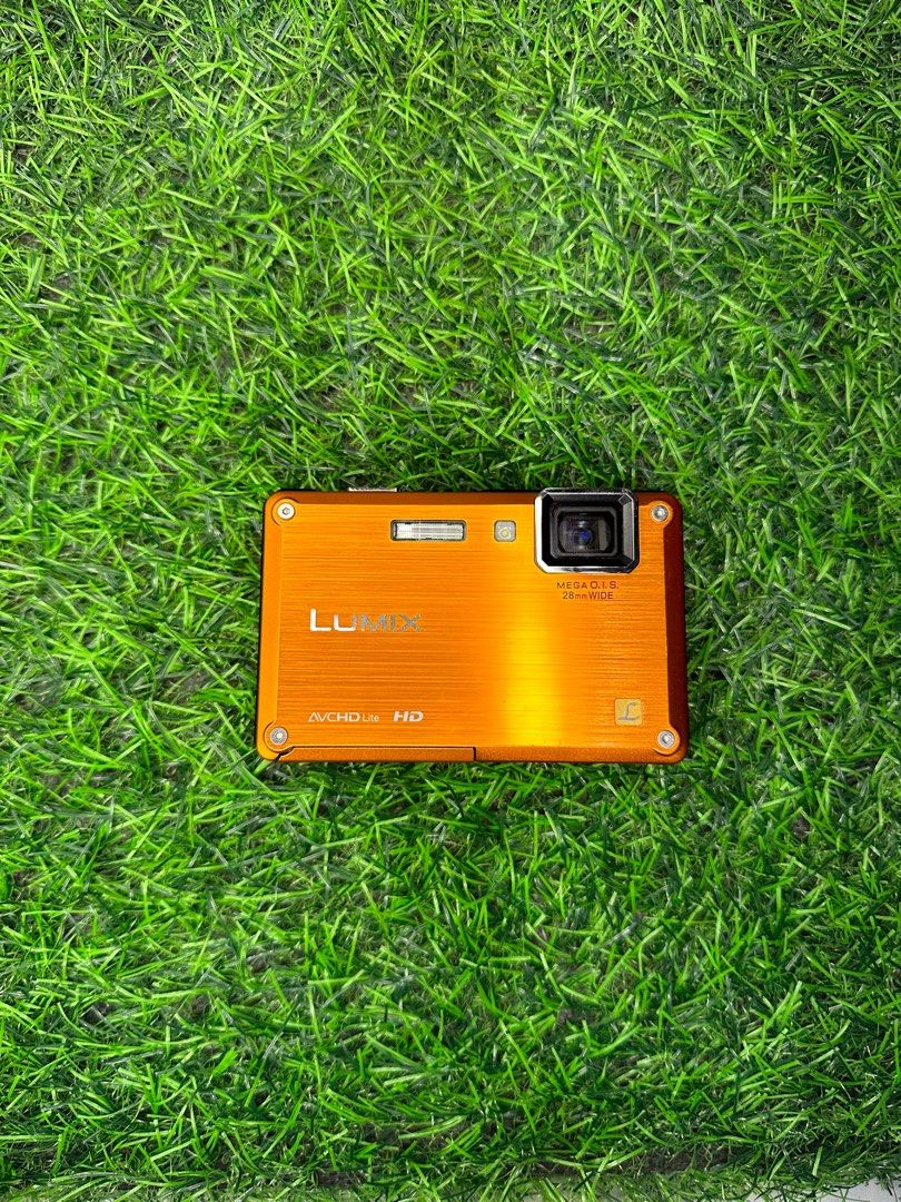 Panasonic Lumix DMC-FT1 Digital Camera (Category: Cameras) located in Iba. Submitted by luxurused (Listing ID 1412279774, Image 1). Description: - Panasonic Lumix DMC-FT11 digital camera (Orange) - Includes: Battery, Charger, Camera - Features: Screen, Buttons, Lens, Flash - Supports: AVCHD Lite HD, MEGA O.I.S. 16.1 MEGA - rfs: Impulse buy comes with orig batt and wall charger issue: japanese language but really easy to figure out..