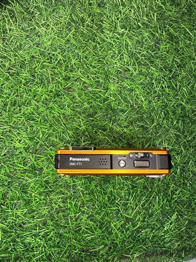 Panasonic Lumix DMC-FT1 Digital Camera (Category: Cameras) located in Iba. Submitted by luxurused (Listing ID 1412279774, Image 3). Description: - Panasonic Lumix DMC-FT11 digital camera (Orange) - Includes: Battery, Charger, Camera - Features: Screen, Buttons, Lens, Flash - Supports: AVCHD Lite HD, MEGA O.I.S. 16.1 MEGA - rfs: Impulse buy comes with orig batt and wall charger issue: japanese language but really easy to figure out..