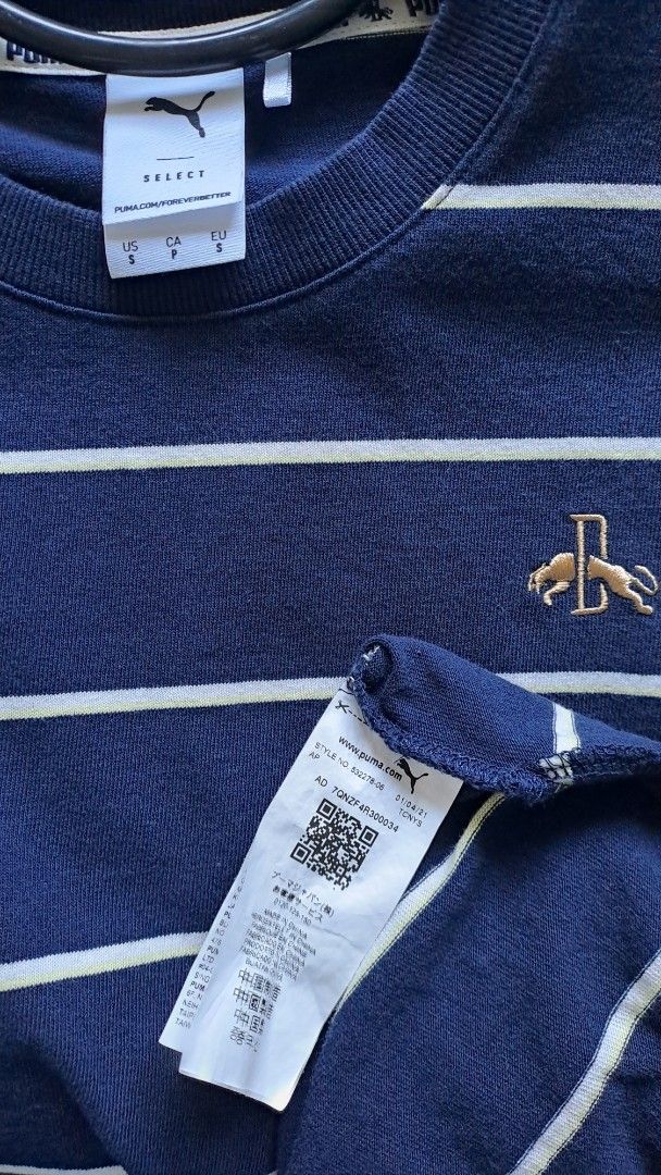 Puma Striped Crew Neck T-shirt (Category: Tshirts & Polo Shirts ) located in Munoz. Submitted by mrkcl_ (Listing ID 1412153346, Image 1). Description: - Navy blue crew neck t-shirt - Features vertical white stripes - Puma logo on chest - Long sleeves - Size: XS Fits Medium - Condition: Excellent to as new.