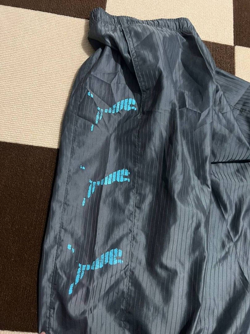 Puma Tracksuit (Category: Sets & Coordinates) located in Baguio. Submitted by thriftowen (Listing ID 1412311123, Image 2). Description: - Puma tracksuit set (jacket and pants) - Color: Grey with light blue Puma logo - Jacket: Full zip closure, high collar - Pants: Elastic waistband and cuffs - Design: Striped pattern.