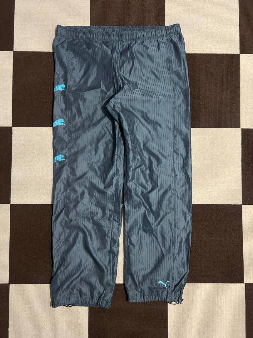 Puma Tracksuit (Category: Sets & Coordinates) located in Baguio. Submitted by thriftowen (Listing ID 1412311123, Image 1). Description: - Puma tracksuit set (jacket and pants) - Color: Grey with light blue Puma logo - Jacket: Full zip closure, high collar - Pants: Elastic waistband and cuffs - Design: Striped pattern.