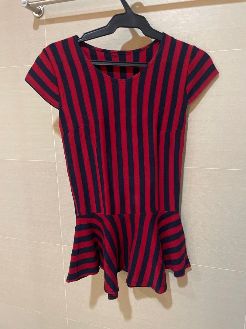 Red and Black Striped Peplum Top (Category: Sleeveless) located in Mandaluyong City. Submitted by beautyfashdeclutter (Listing ID 1412223779, Image 1). Description: - Red and navy blue striped pattern blouse - Flattering peplum design - Short sleeves - Scoop neckline - Comfortable and soft fabric - Ideal for casual wear.