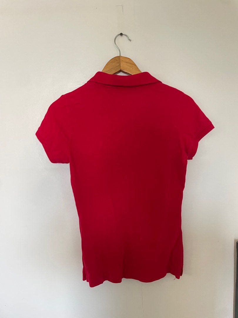 Red Polo Shirt (Category: Others Tops) located in Cavite. Submitted by _nicoffee (Listing ID 1412194490, Image 3). Description: - Classic red polo shirt - Collared neckline - Free with 500 pesos worth of items bought from my shop -Bust: 30-32in Length: 23in.