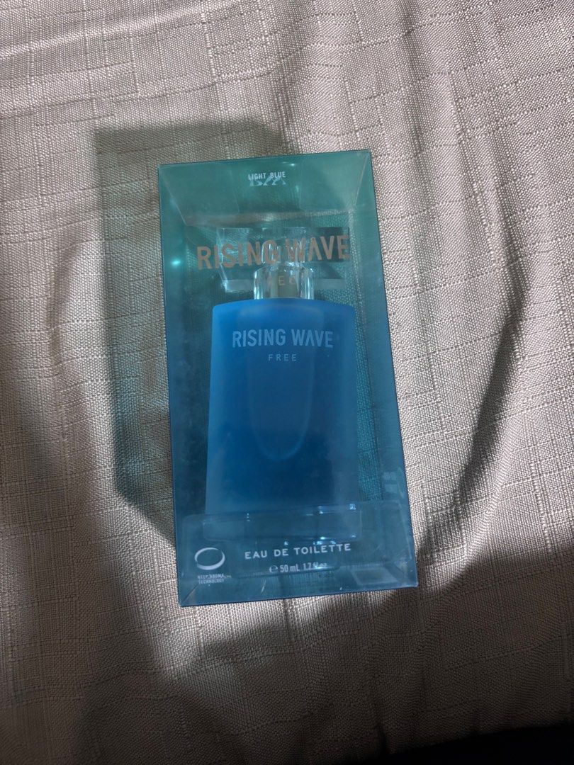 Rising Wave Free Eau de Toilette 50ml (Category: Fragrance & Deodorants) located in Quezon City. Submitted by prelovedbypla (Listing ID 1412300236, Image 1). Description: - Rising Wave Free Eau de Toilette - 50ml bottle - Frosted blue glass bottle - Includes original box - Made in Japan.