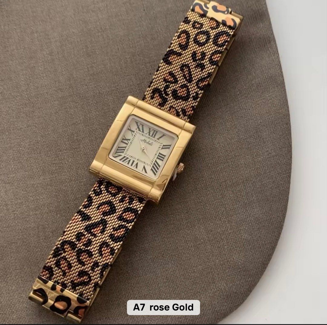 Rose Gold Leopard Print Watch (Category: Women's Watches) located in Pasay City. Submitted by dunkinn (Listing ID 1412321618, Image 1). Description: - Rose gold watch - Unique leopard print strap - Rectangular face with Roman numeral hour markers - Comfortable mesh strap - Stylish accessory.