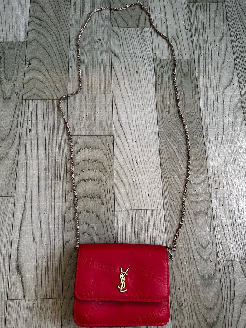 Saint Laurent Mini Red Crossbody Bag (Category: Luxury Bags & Wallets) located in San Fernando. Submitted by sandyayvii (Listing ID 1412177979, Image 1). Description: ysl mini crossbody bag needs cleaning only.