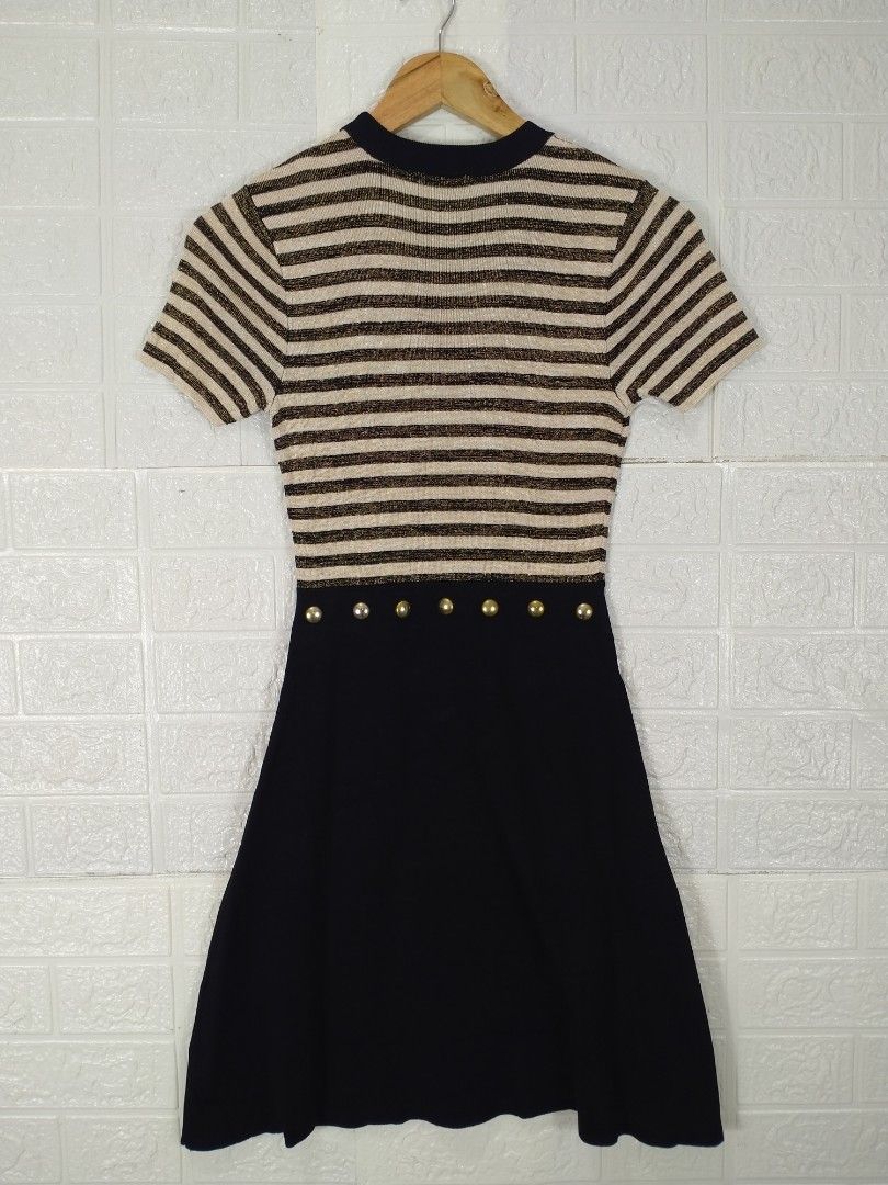 Sandro Paris Striped Dress (Category: Luxury Apparel) located in Baguio. Submitted by dansteals (Listing ID 1412282465, Image 2). Description: - Sandro Paris dress - Striped top with a solid black skirt - Features short sleeves - Gold-colored buttons at the waist - Round neckline - Made in France Length: 33 Width: 14 Waist: 24.