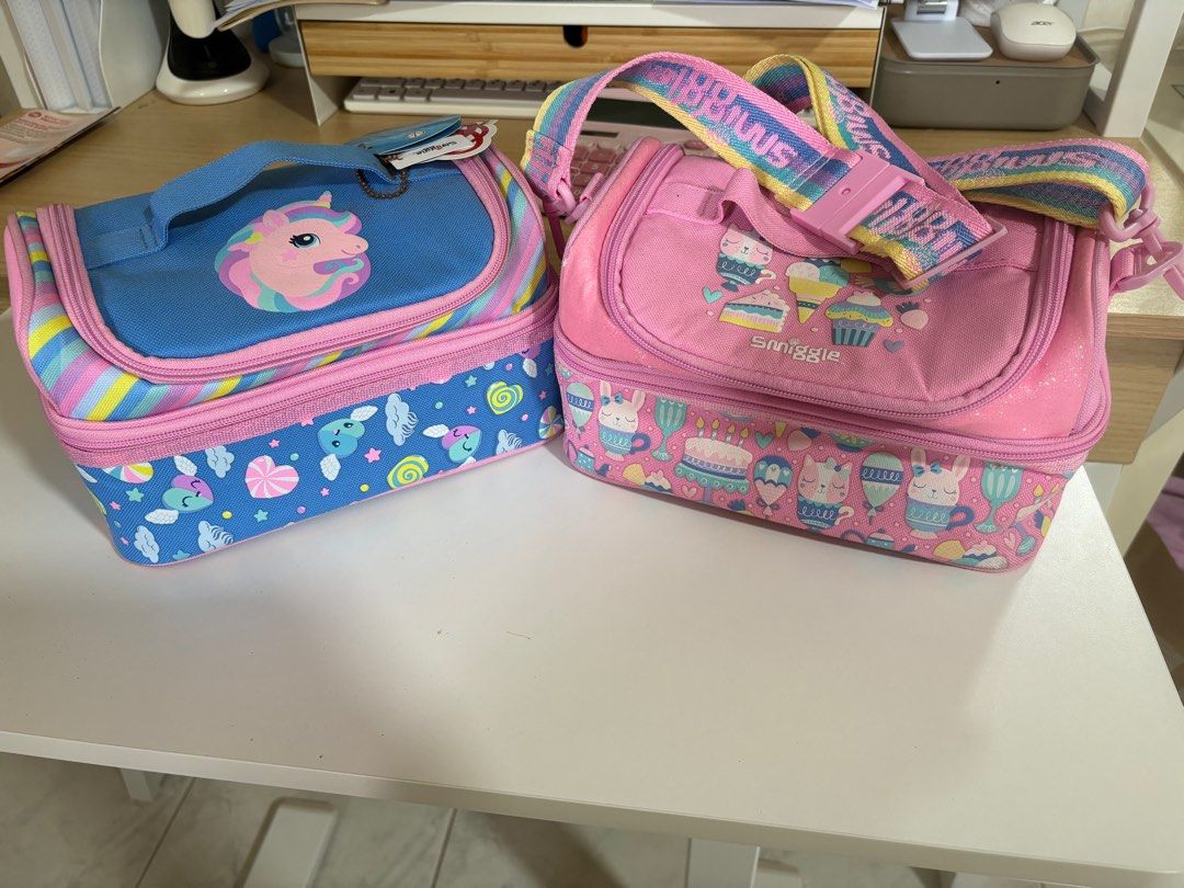 Smiggle Double Decker Lunchbox - Unicorn & Cupcake Designs (Category: Food Organisation & Storage) located in Singapore. Submitted by angelinazhang (Listing ID 1412159221, Image 1). Description: $10/each , 2 for 17.
