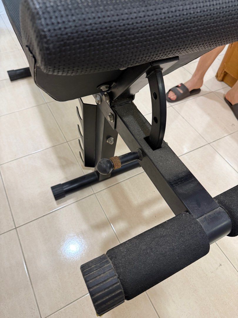 Solid Sit Up Bench (Category: Weights & Dumbells) located in Petaling Jaya. Submitted by le_luna (Listing ID 1412294520, Image 3). Description: One on one trainer system Solid sit up bench Bought for RM 600 Condition: 7/10 (signs of use but still very solid, the nut is rusty but I think it can be replaced) Reason for selling: not using anymore .