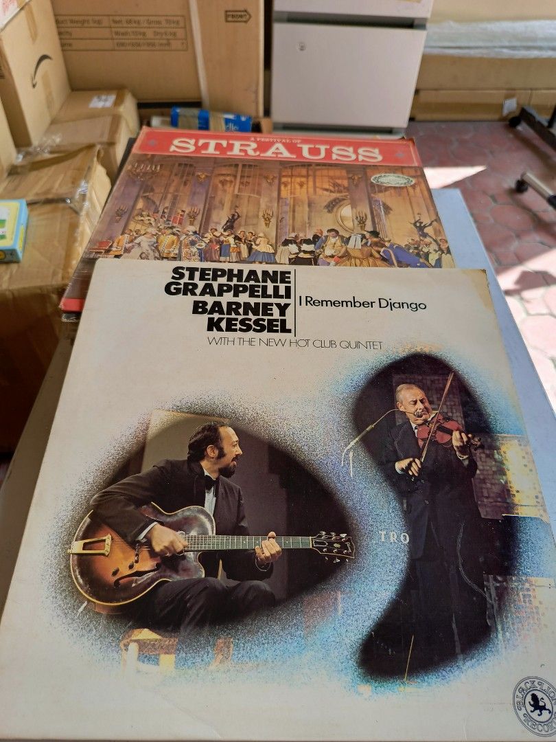 Stephane Grappelli Barney Kessel Vinyl Record (Category: Vinyls) located in Legazpi City. Submitted by kikosgarage (Listing ID 1412222984, Image 1). Description: - Artist: Stephane Grappelli & Barney Kessel - Album: "I Remember Django" with The New Hot Club Quintet - Features: Vinyl record - Condition: Good - Cover Art: Features a guitarist and violinist.