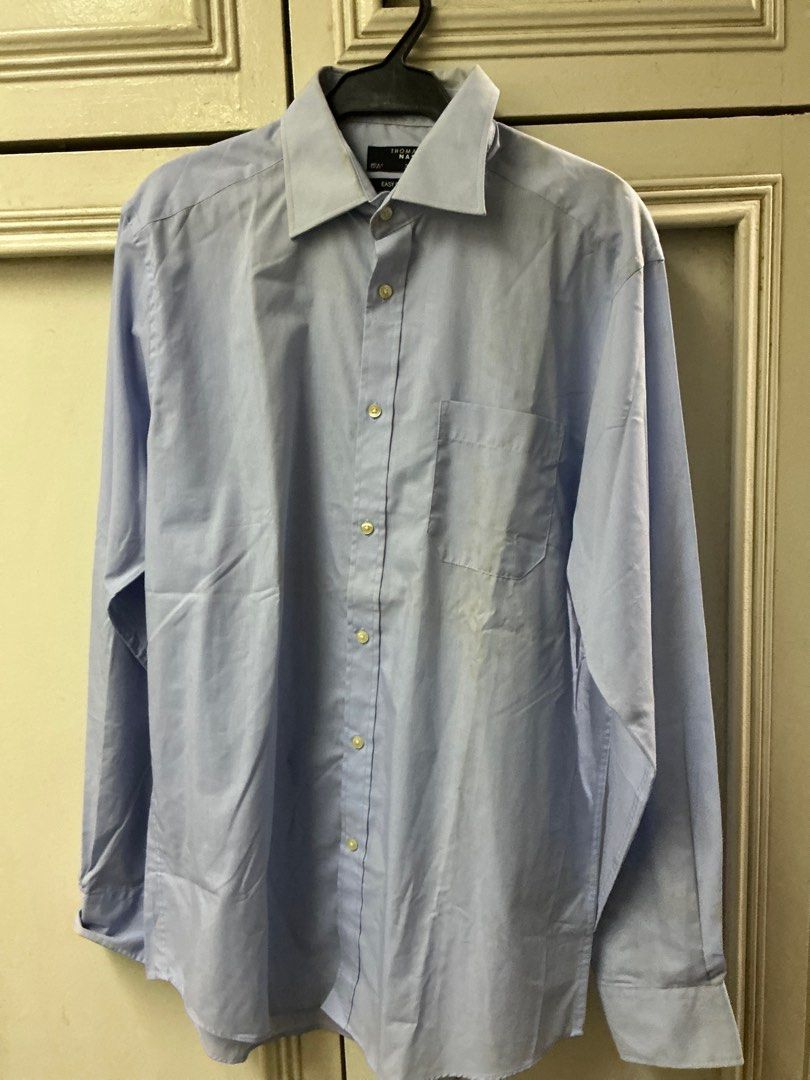 Thomas Nash Easy Care Long Sleeve Shirt (Category: Tshirts & Polo Shirts ) located in Manila. Submitted by harbs05 (Listing ID 1412253445, Image 1). Description: - Thomas Nash light blue long sleeve shirt - Size: 15 1/2, 39.5cm - Features: - Button-down front - Chest pocket - Classic collar - Made with easy-care fabric - Suitable for casual and formal wear - Has stain but can be laundried.