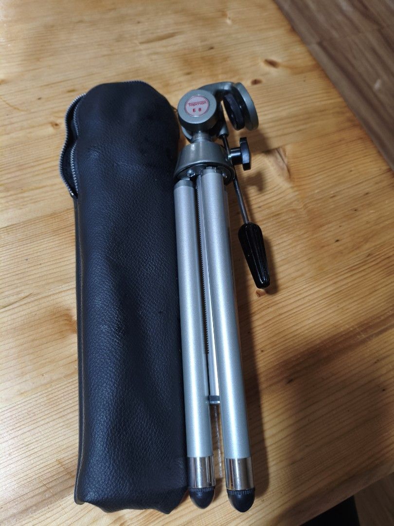 Topman E-8 Compact Tripod with Case (Category: Tripods & Monopods) located in Baguio. Submitted by baguiobeans (Listing ID 1412259350, Image 1). Description: - Topman E-8 Tripod - Includes carrying case - Adjustable legs - Pan head with degree markings - Made in Japan - In good working condition - Ideal for photography.
