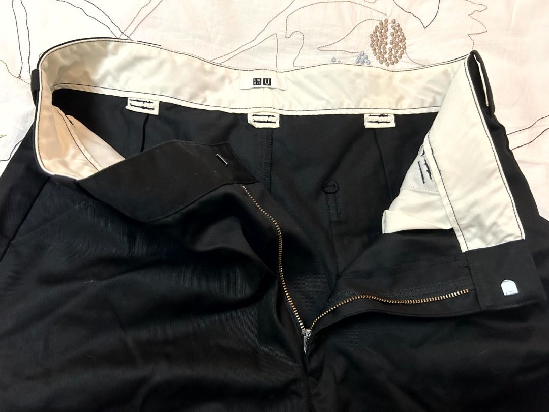 Uniqlo Black Pants (Category: Other Bottoms) located in Quezon City. Submitted by outoftheboxph (Listing ID 1412306416, Image 2). Description: - Uniqlo black pants Features: - Zipper closure - Straight leg cut - Material: 70% polyester, 30% cotton - Size: waist 91 cm - Length: 41" Condition: never used. no tags.